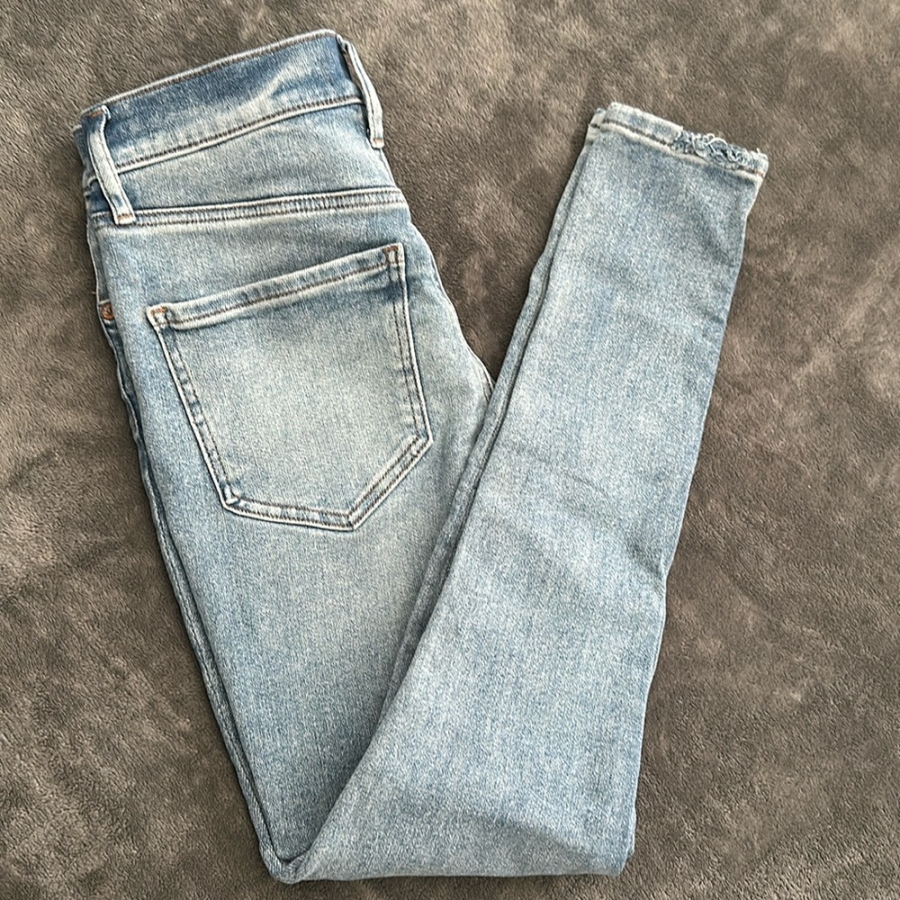 Light wash distressed jeans